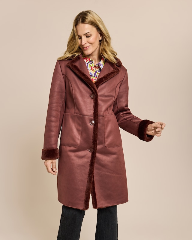 Wendemantel aus Webpelz