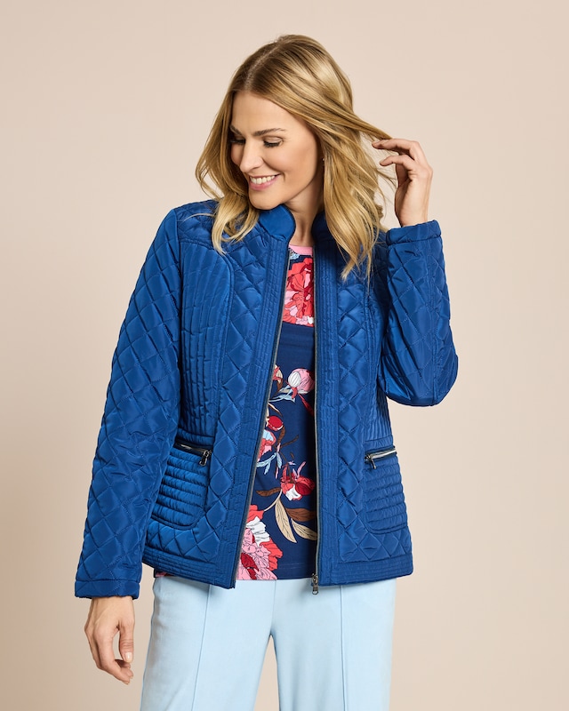 Steppjacke mit Lederimitat-Paspeln