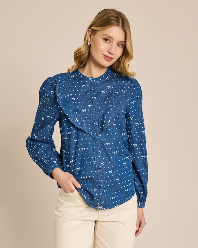 Bluse mit Schleifendruck und Rüschen